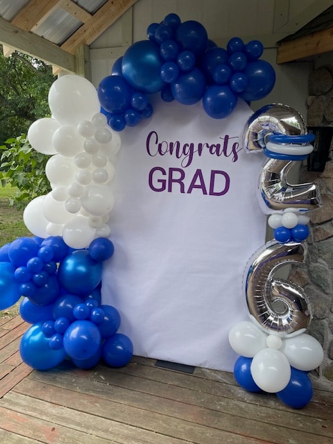 Congrats Grad blue and white balloon arch backdrop